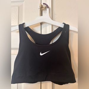 Nike Women’s sports bra. Black with white check. Size L